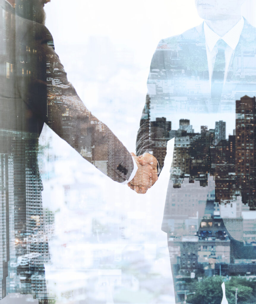 Corporate business handshake between business partners